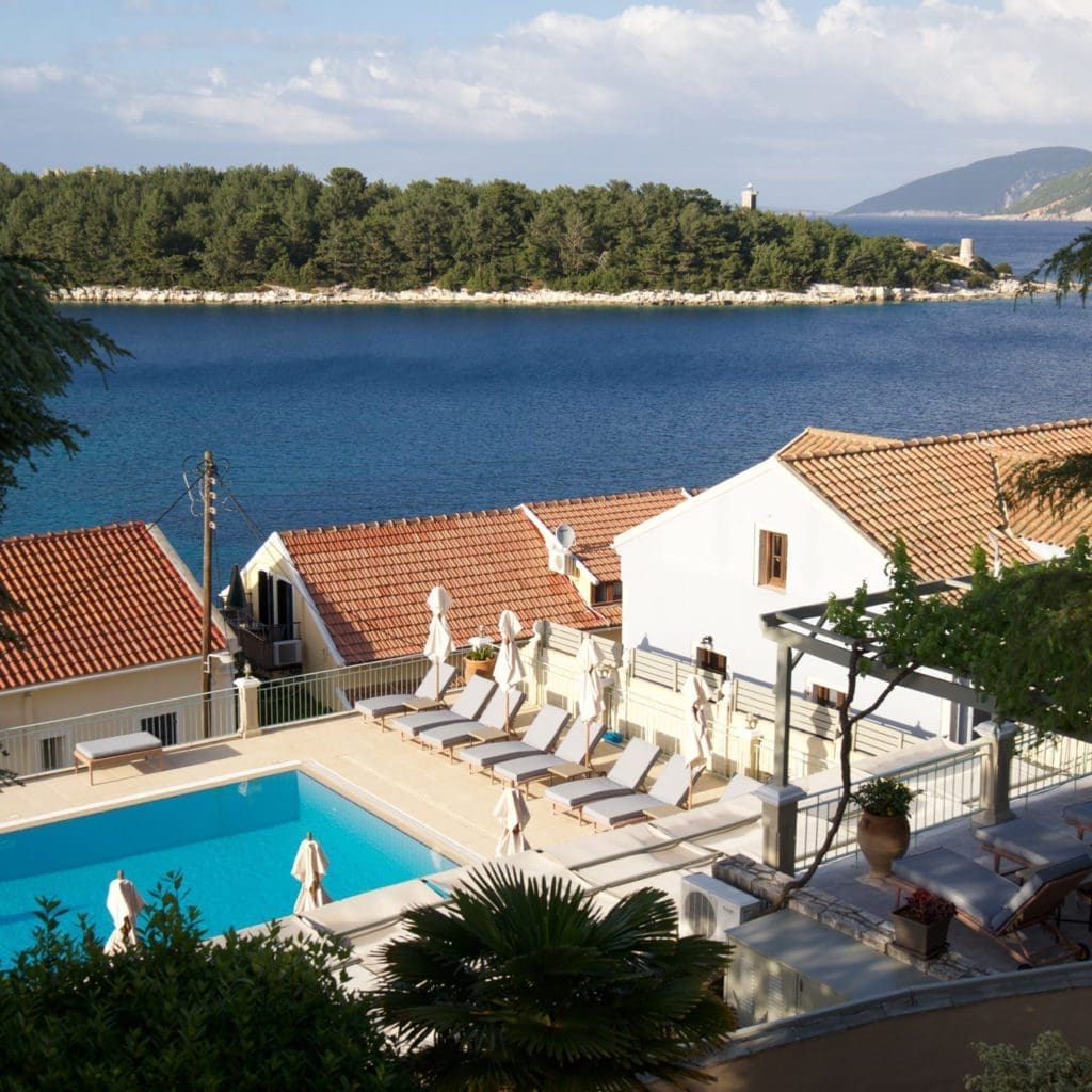 Poolside loungers overlooking the Ionian Sea in Fiskardo