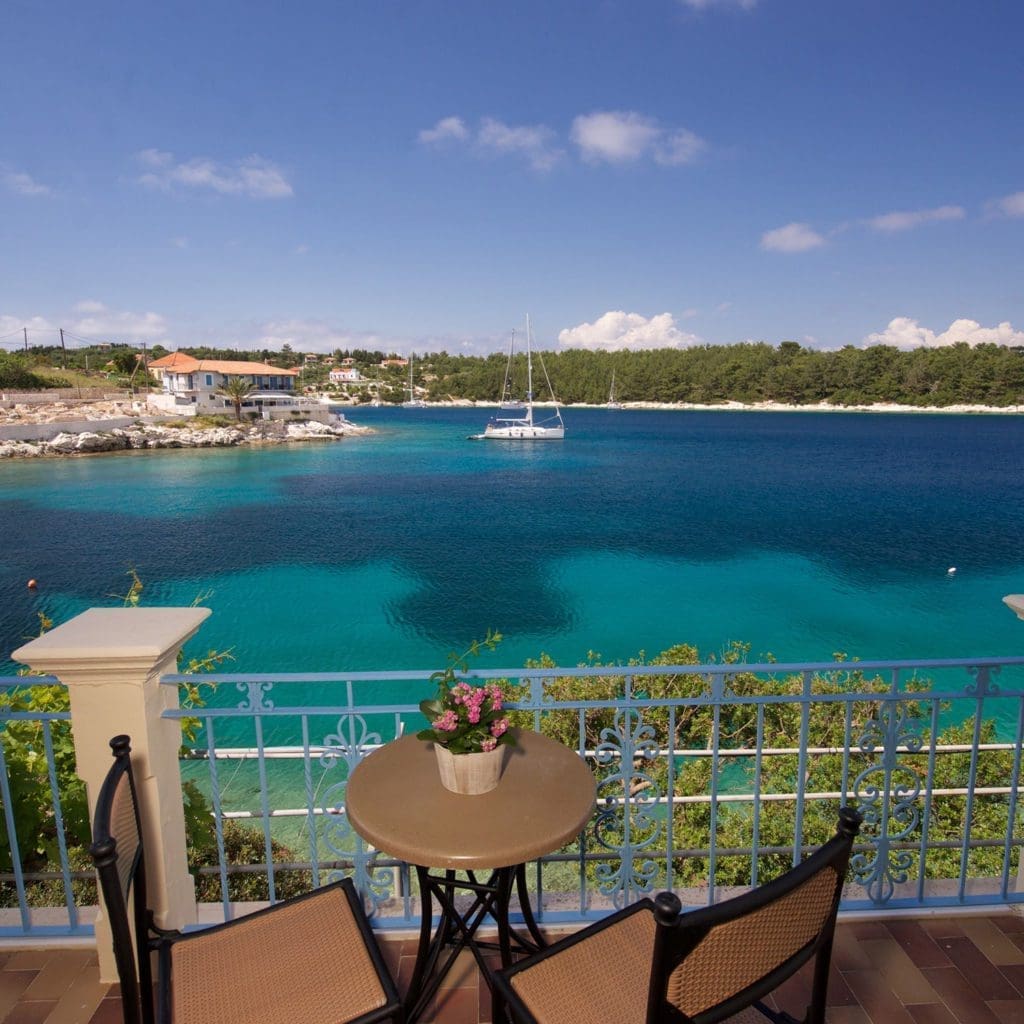 Balcony with flowers overlooking the Ionian Sea in Fiskardo
