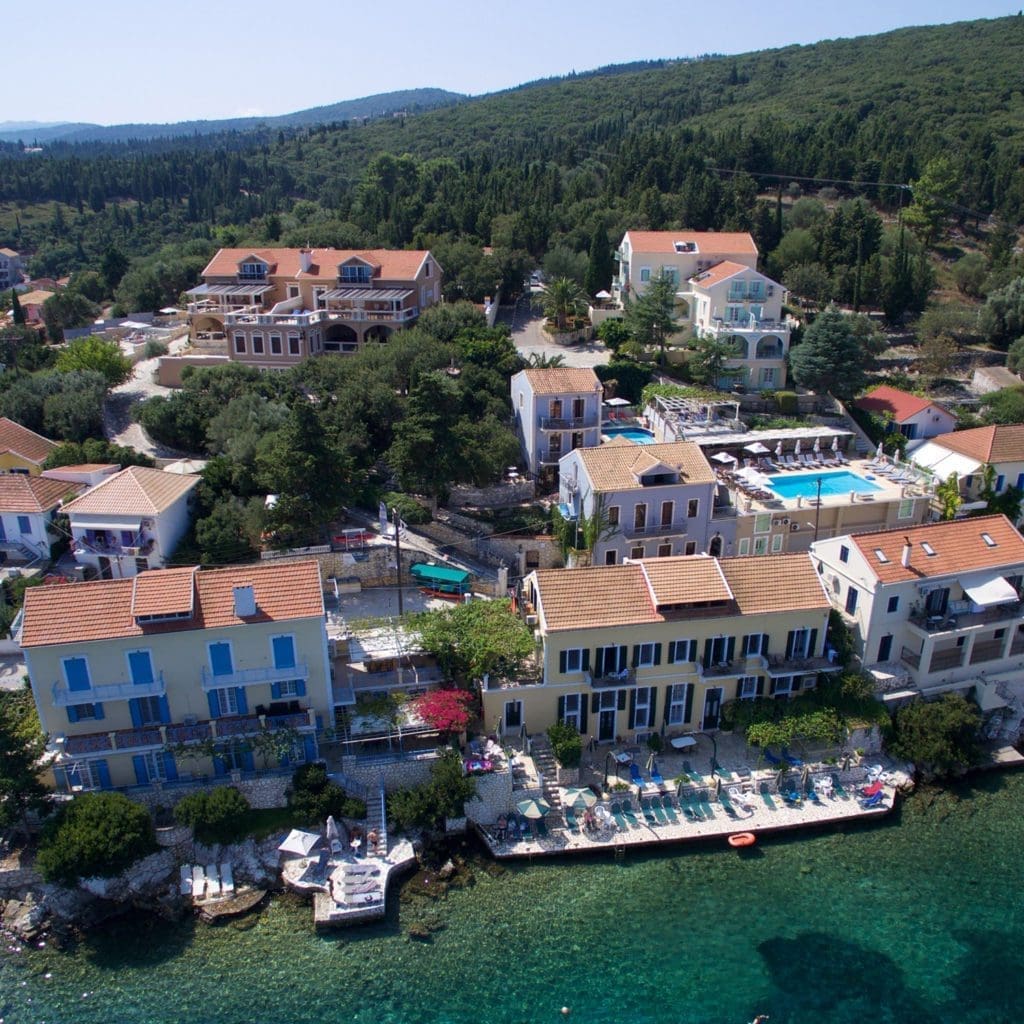 Seafront apartments above crystal clear water in Fiskardo Kefalonia